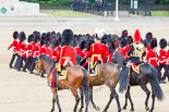 Trooping the Colour 2013: The March Off - No. 6 Guard, No. 7 Company Coldstream Guards are the last guards divison to leave Horse Guards Parade. Riding towards them are the Aide-de-Camp, Captain John James Hathaway-White, Grenadier Guards, the Chief of Staff, Colonel Hugh Bodington, Welsh Guards, and the Silver-Stick-in-Waiting, Colonel Stuart Cowen, The Blues and Royals. Image #850, 15 June 2013 12:12 Horse Guards Parade, London, UK