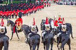 Trooping the Colour 2013: The March Off - the guards divisions are marching towards The Mall, followed by Brigade Major Household Division Lieutenant Colonel Simon Soskin, Grenadier Guards, and the four troopers from The Life Guards and the four troopers from The Blues and Royals. Image #853, 15 June 2013 12:12 Horse Guards Parade, London, UK
