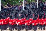 Trooping the Colour 2013: The March Off - lines of scarlet and black as the guardsmen, with their bearskins, are marching up Horse Guards Road towards The Mall. Image #867, 15 June 2013 12:13 Horse Guards Parade, London, UK