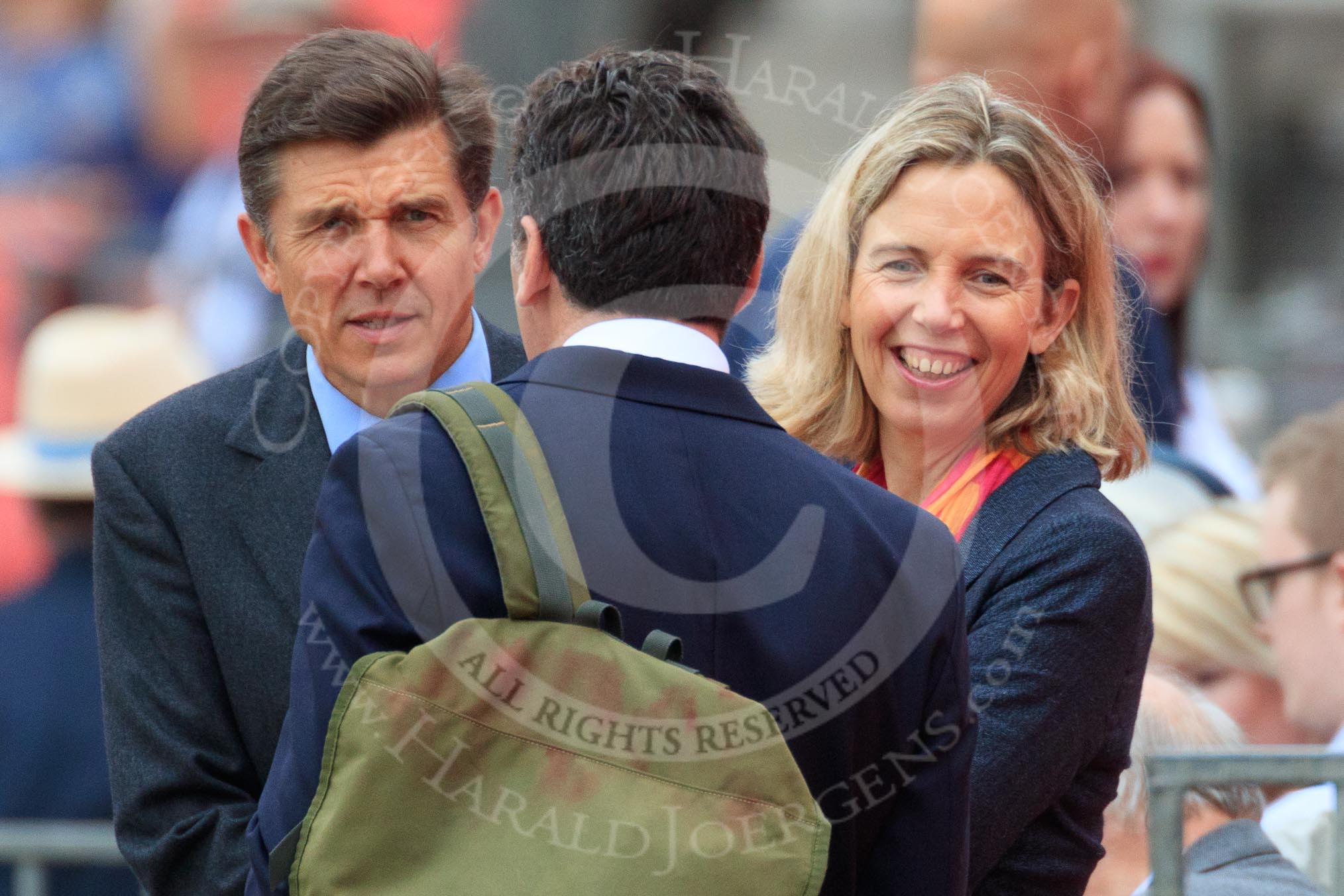 Visitors chatting on one of the grandstands before The Colonel's Review 2018 (final rehearsal for Trooping the Colour, The Queen's Birthday Parade)  at Horse Guards Parade, Westminster, London, 2 June 2018, 09:21.