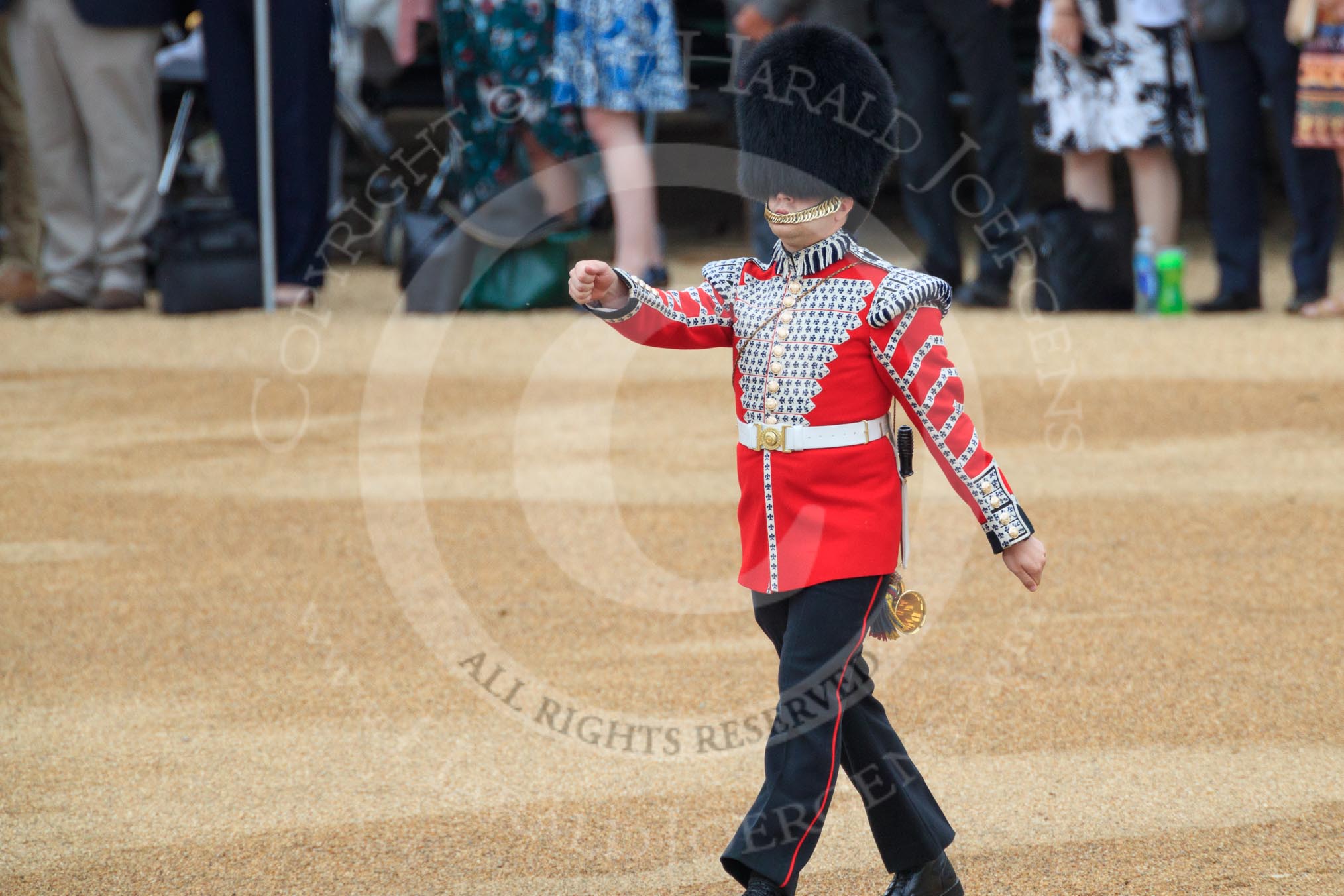 Duty Drummer  Sam Orchard is marching forward to uncase the Colour during The Colonel's Review 2018 (final rehearsal for Trooping the Colour, The Queen's Birthday Parade)  at Horse Guards Parade, Westminster, London, 2 June 2018, 10:33.