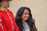 Woman with long black hair posing with a Coldstream Guards Captain for a photo before  The Colonel's Review 2018 (final rehearsal for Trooping the Colour, The Queen's Birthday Parade)  at Horse Guards Parade, Westminster, London, 2 June 2018, 09:14.