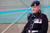 Army photographer in uniform, wearing his medals and cameras, at the Wolseley press stand before The Colonel's Review 2018 (final rehearsal for Trooping the Colour, The Queen's Birthday Parade)  at Horse Guards Parade, Westminster, London, 2 June 2018, 09:21.