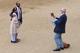 Father and daughter having their photo taken before The Colonel's Review 2018 (final rehearsal for Trooping the Colour, The Queen's Birthday Parade)  at Horse Guards Parade, Westminster, London, 2 June 2018, 09:28.