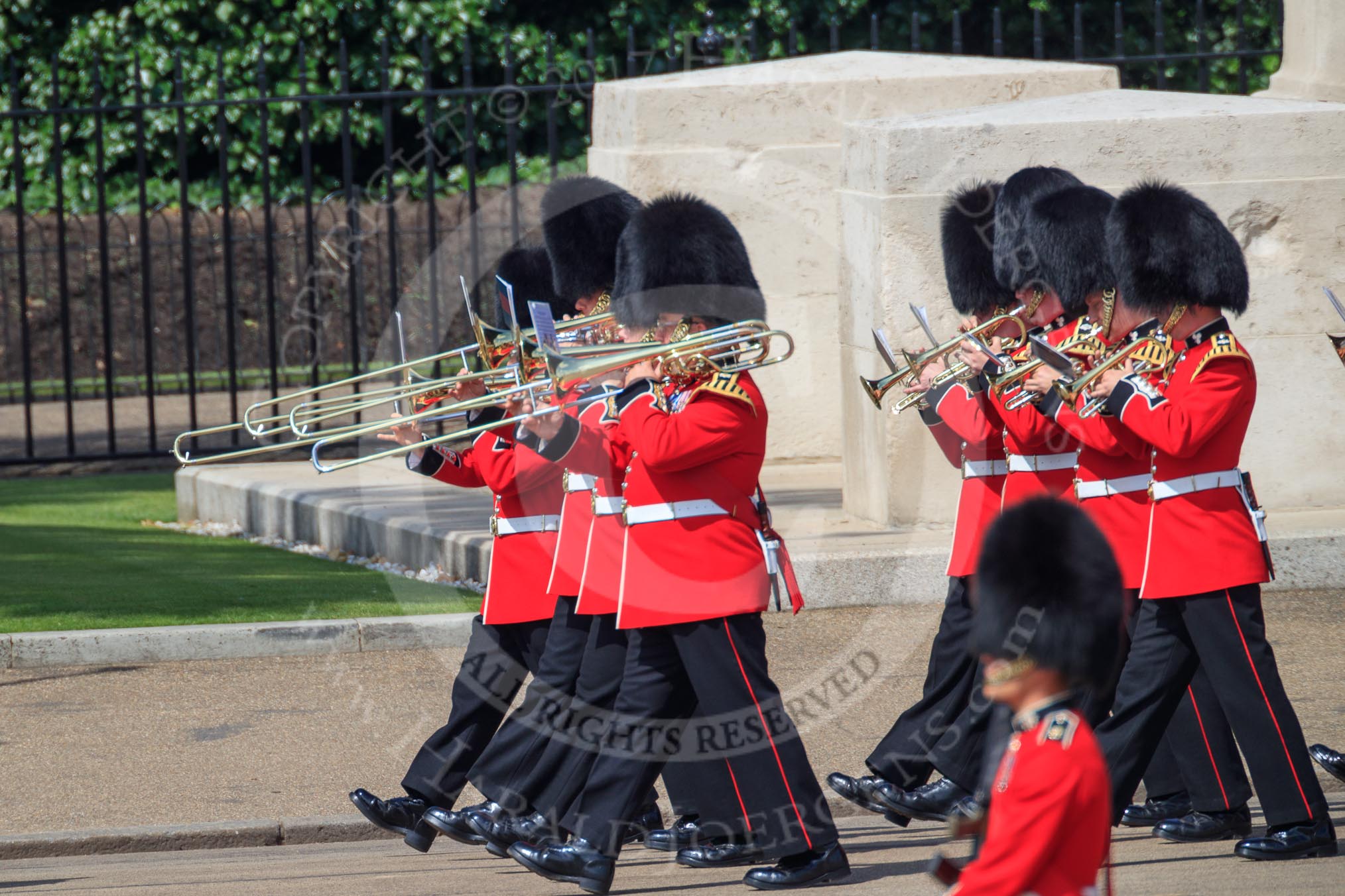 Musicians of the Band of the Irish Guards marching past the Guards Memorial during Trooping the Colour 2018, The Queen's Birthday Parade at Horse Guards Parade, Westminster, London, 9 June 2018, 10:28.