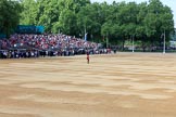 A musician from the Band of the Welsh Guards standing  on Horse Guards Parade to mark the destination for the arriving band during Trooping the Colour 2018, The Queen's Birthday Parade at Horse Guards Parade, Westminster, London, 9 June 2018, 10:13.