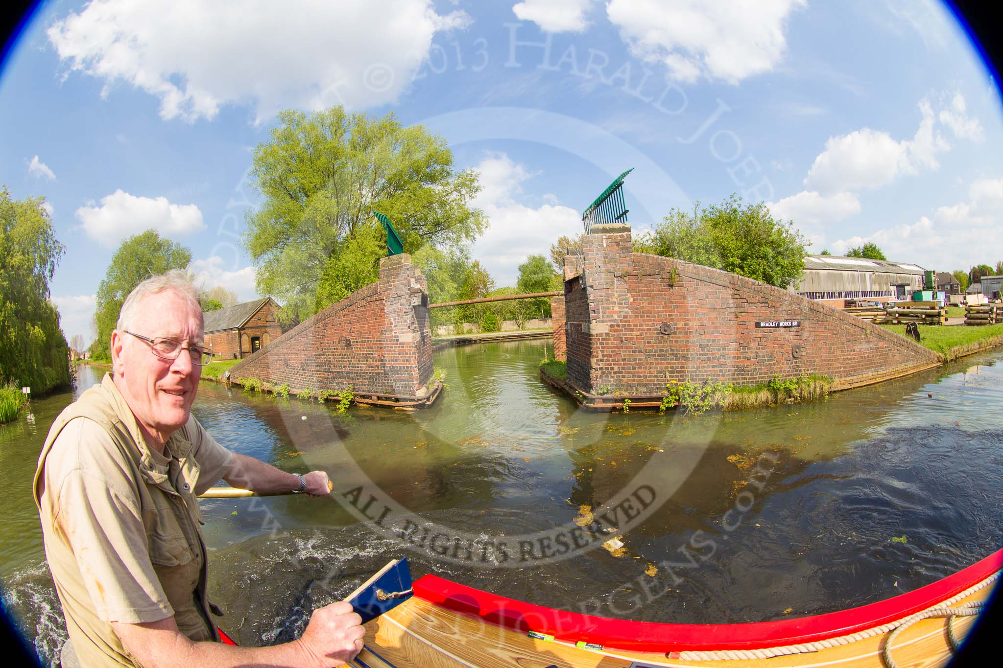 BCN Marathon Challenge 2013: Skipper Charley on board of NB "Felonious Mongoose" at Bradley Works Bridge, the entrance to the British Waterways Bradley Workshops at the end of the Bradley Branch..
Birmingham Canal Navigation,


United Kingdom,
on 25 May 2013 at 16:08, image #227