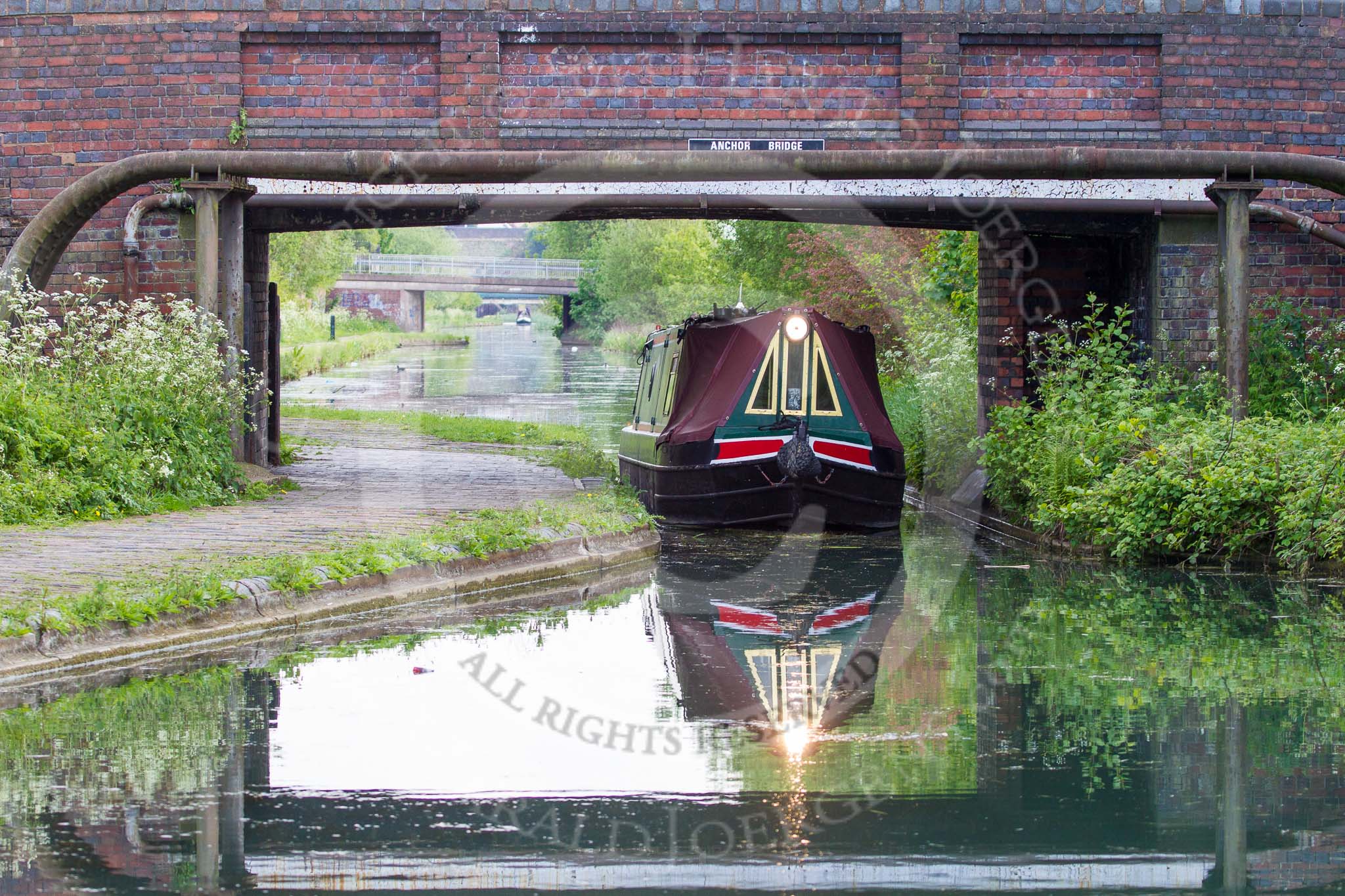 BCN Marathon Challenge 2013: A narrowboaat in the bridgehole of Anchor Bridge on the BCN New Main Line, close to Deepfields Junction with the Bradley Branch..
Birmingham Canal Navigation,


United Kingdom,
on 25 May 2013 at 17:09, image #252