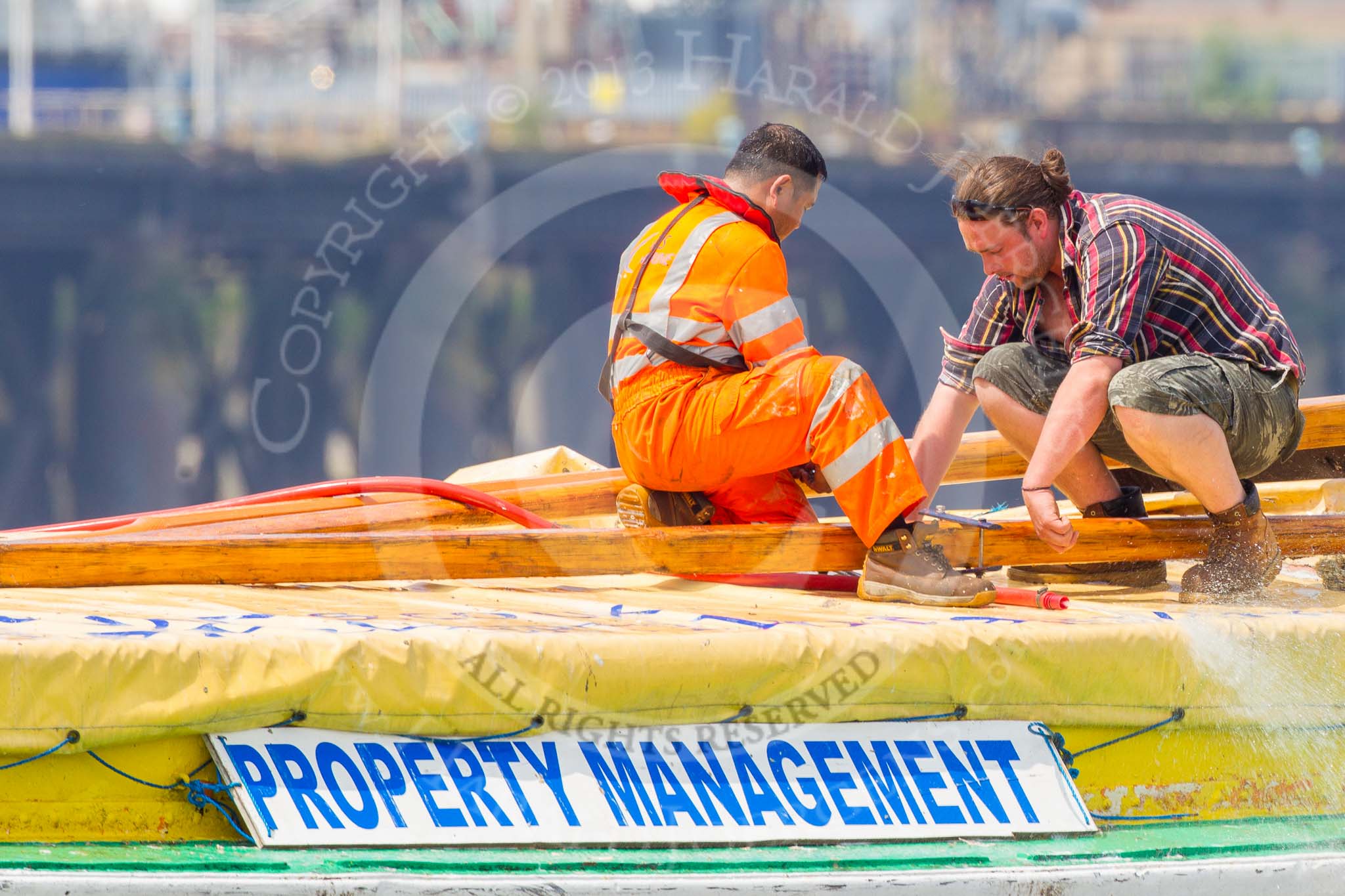 TOW River Thames Barge Driving Race 2013: Preparations for the race on board of barge "Hoppy", by GPS Fabrication, before the start of the race..
River Thames between Greenwich and Westminster,
London,

United Kingdom,
on 13 July 2013 at 12:15, image #56