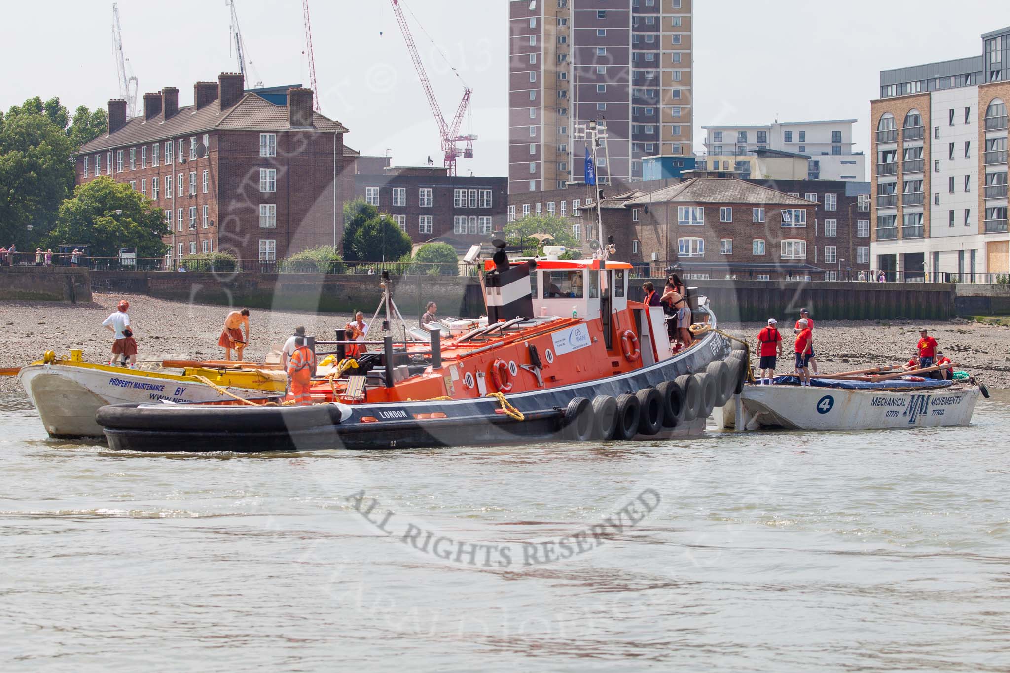 TOW River Thames Barge Driving Race 2013: Barge "Hoppy", by GPS Fabrication, on the left, and barge "Spirit of Mountabatten", by Mechanical Movements and Enabling Services Ltd, in front of GPS Marine tug "GPS Vincia"..
River Thames between Greenwich and Westminster,
London,

United Kingdom,
on 13 July 2013 at 12:24, image #80