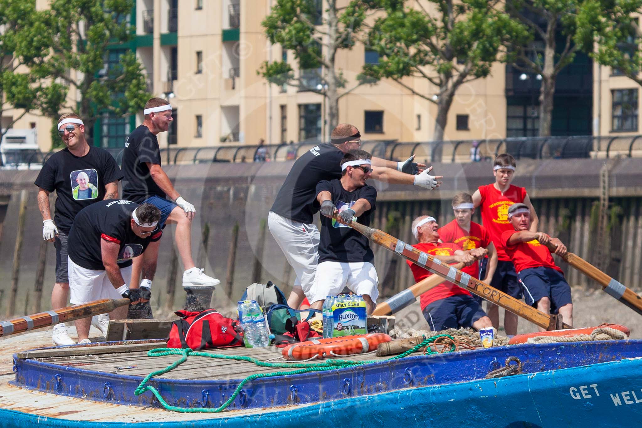 TOW River Thames Barge Driving Race 2013: Rowers on barge barge "Darren Lacey", by Princess Pocahontas, taunting rowers on barge "Spirit of Mountabatten", by Mechanical Movements and Enabling Services Ltd, on their right..
River Thames between Greenwich and Westminster,
London,

United Kingdom,
on 13 July 2013 at 12:42, image #182