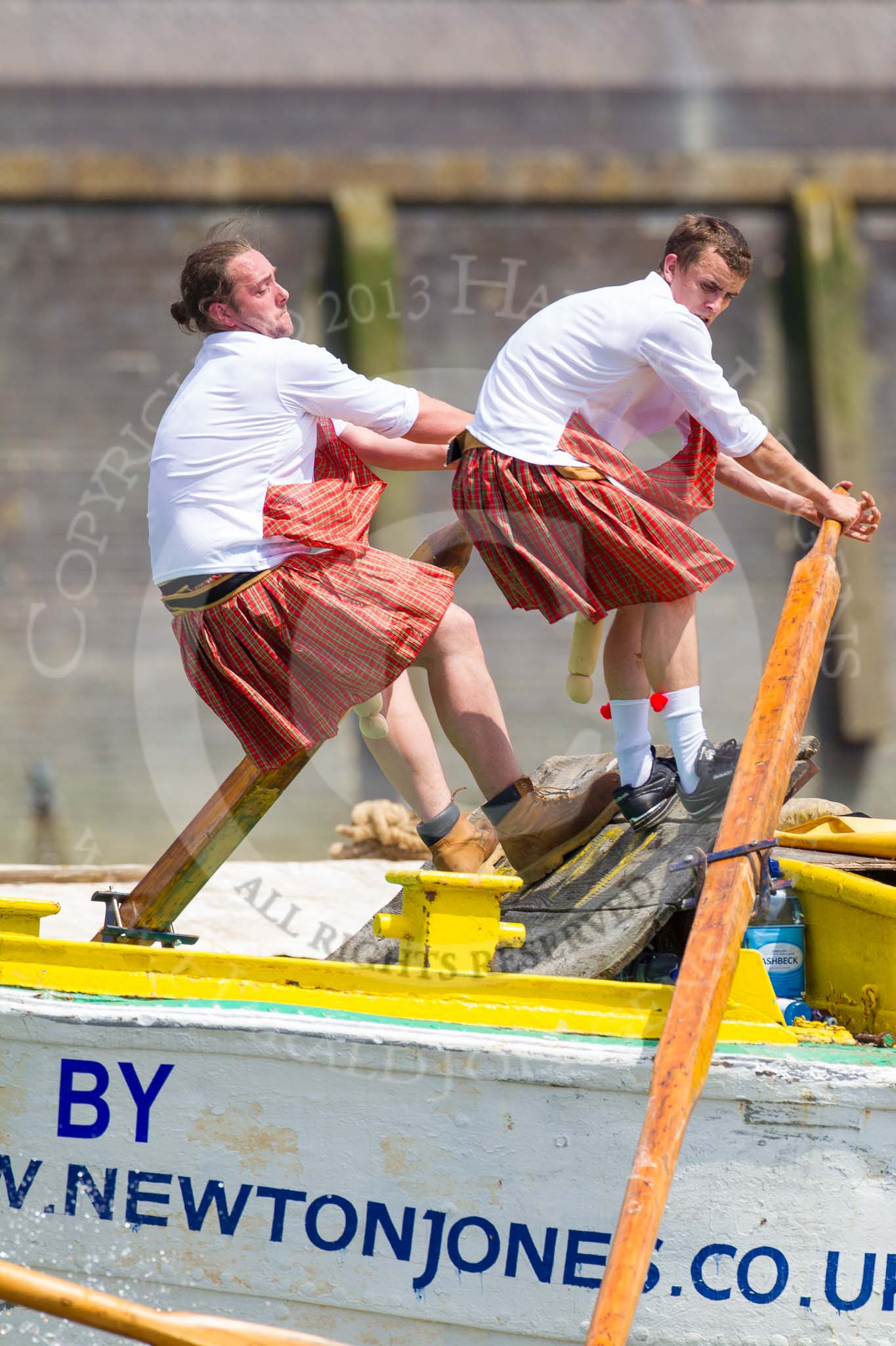 TOW River Thames Barge Driving Race 2013: Rowers wearing skirts on the deck of of barge "Hoppy" by GPS Fabrication..
River Thames between Greenwich and Westminster,
London,

United Kingdom,
on 13 July 2013 at 12:44, image #191