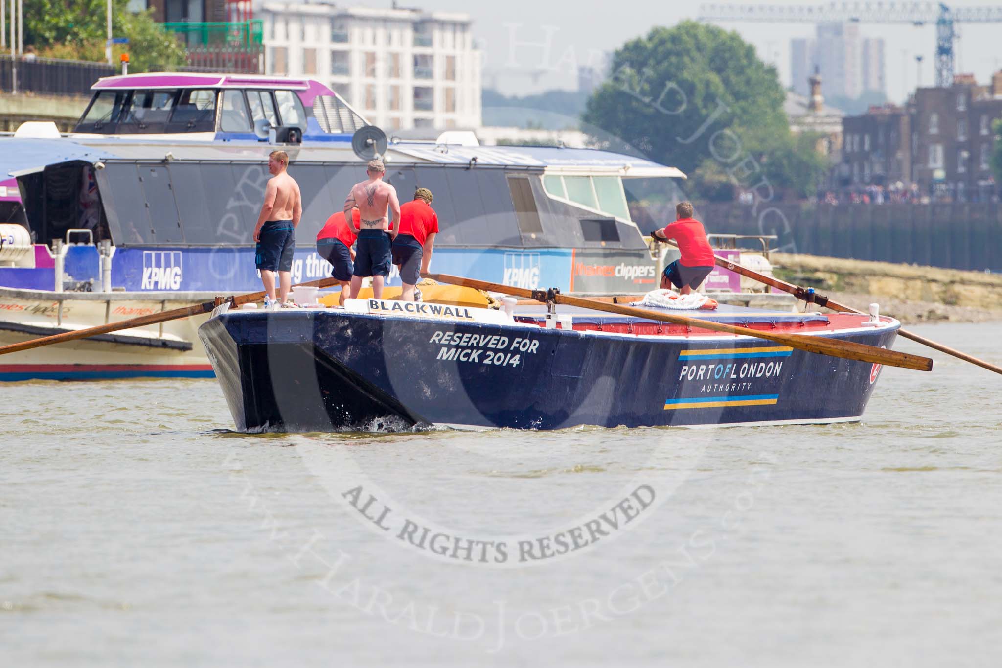 TOW River Thames Barge Driving Race 2013: Barge "Blackwall", by the Port of London Authority, seen in front of a Thames Clippers pleasure boat..
River Thames between Greenwich and Westminster,
London,

United Kingdom,
on 13 July 2013 at 12:45, image #199