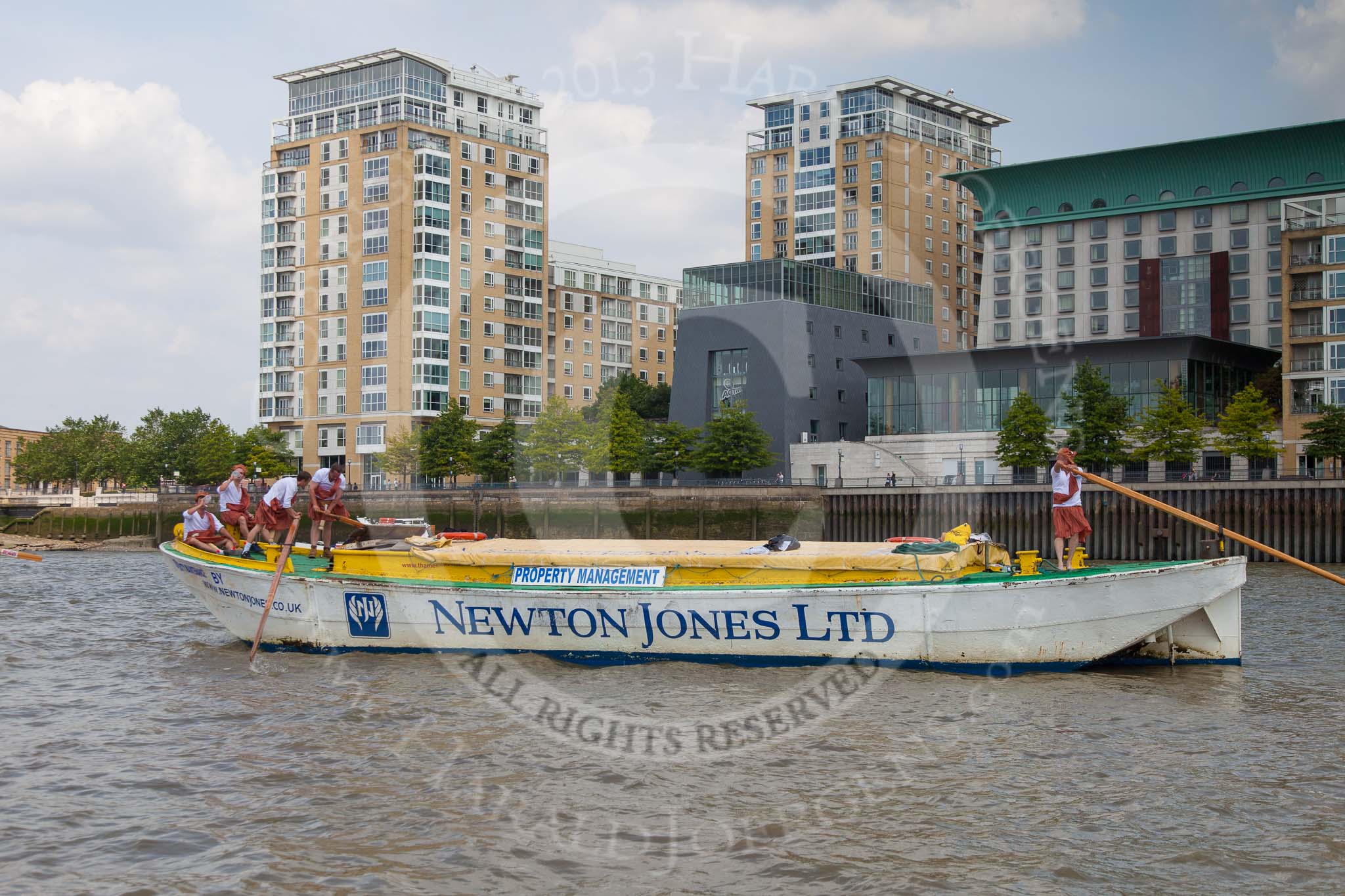TOW River Thames Barge Driving Race 2013: Barge "Hoppy", by GPS Fabrication, in front of the Virgin Active Heaalth Club at West Ferry Circus, Canary Wharf..
River Thames between Greenwich and Westminster,
London,

United Kingdom,
on 13 July 2013 at 13:15, image #297