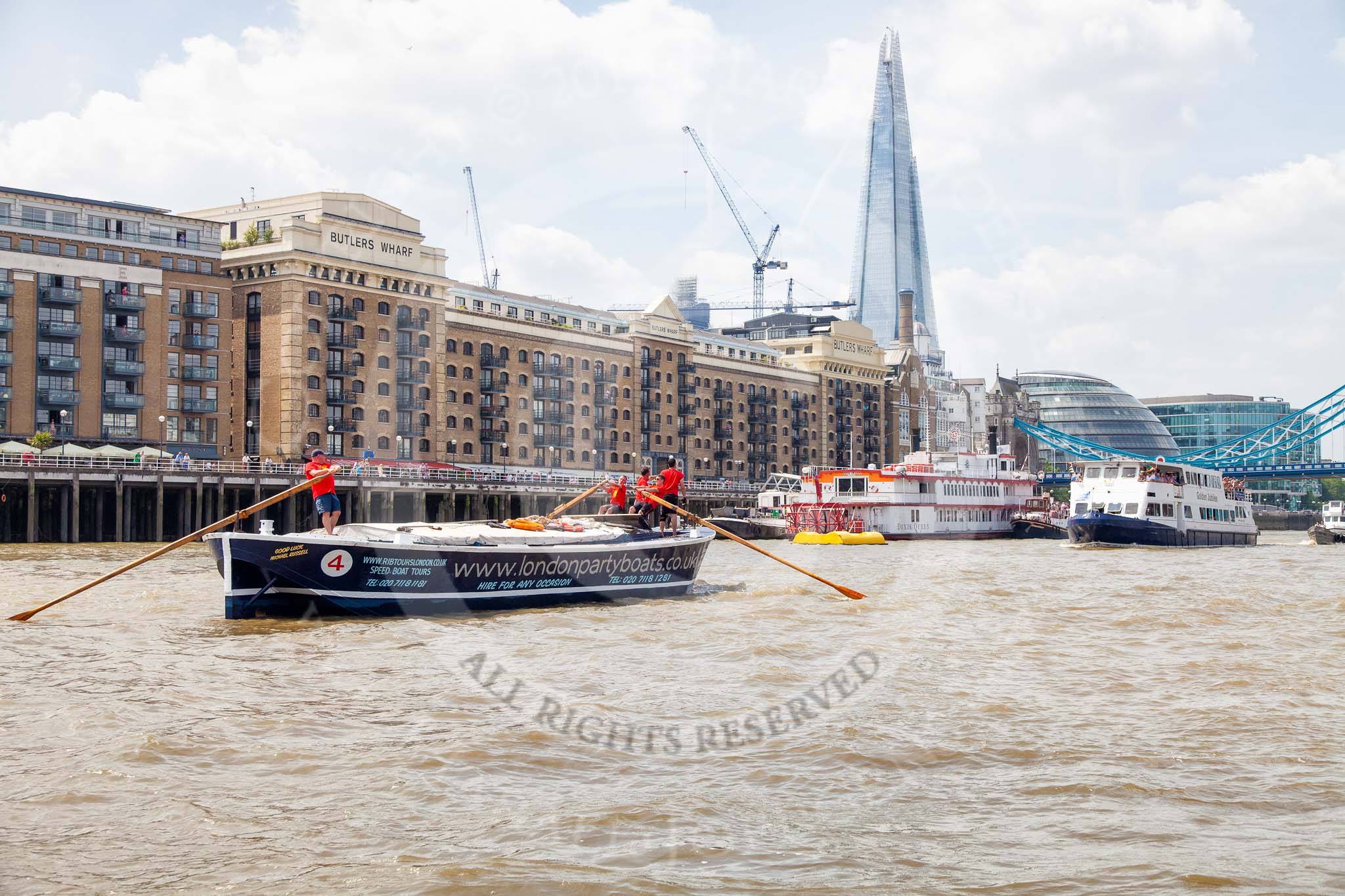 TOW River Thames Barge Driving Race 2013: Barge "Benjamin", by London Party Boats, in front of Butlers Wharf. On the right the Shard building, City Hall, and Tower Bridge..
River Thames between Greenwich and Westminster,
London,

United Kingdom,
on 13 July 2013 at 13:43, image #383