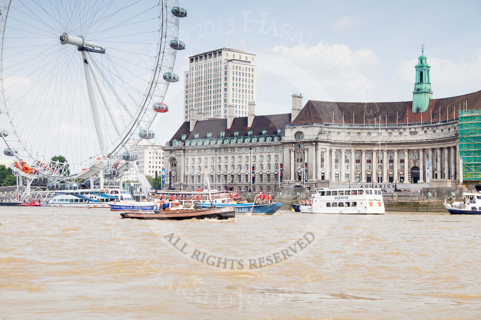 TOW River Thames Barge Driving Race 2013: Barge "Diana", by Trinity Buoy Wharf, at the London Eye, followed by barge "Steve Faldo" by Capital Pleasure Boats, in front of the London Eye and the London Aquarium..
River Thames between Greenwich and Westminster,
London,

United Kingdom,
on 13 July 2013 at 14:17, image #426