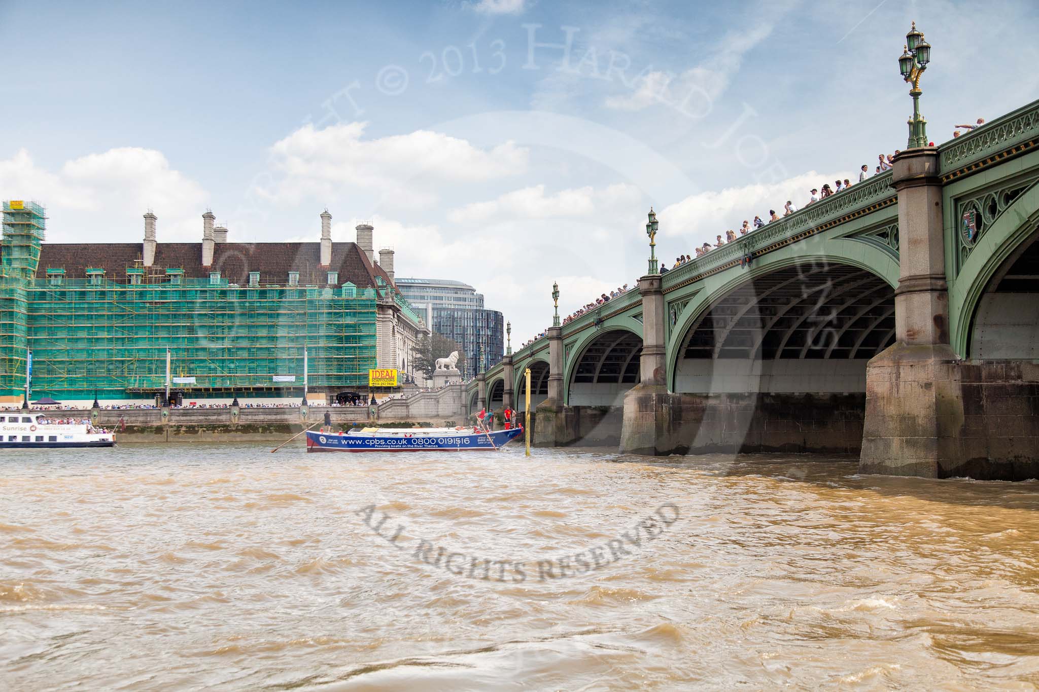 TOW River Thames Barge Driving Race 2013: Barge barge "Steve Faldo" by Capital Pleasure Boats, crossing the finish of the race at Westminster Bridge..
River Thames between Greenwich and Westminster,
London,

United Kingdom,
on 13 July 2013 at 14:18, image #430