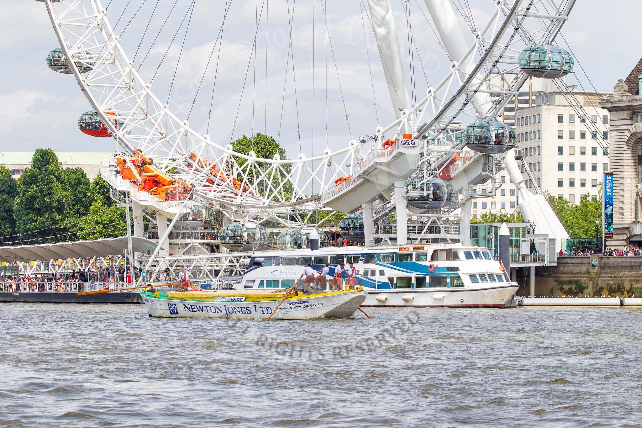 TOW River Thames Barge Driving Race 2013: Barge "Hoppy", by GPS Fabrication, at the London Eye, close to the finish of the race at Westminster Bridge..
River Thames between Greenwich and Westminster,
London,

United Kingdom,
on 13 July 2013 at 14:26, image #459