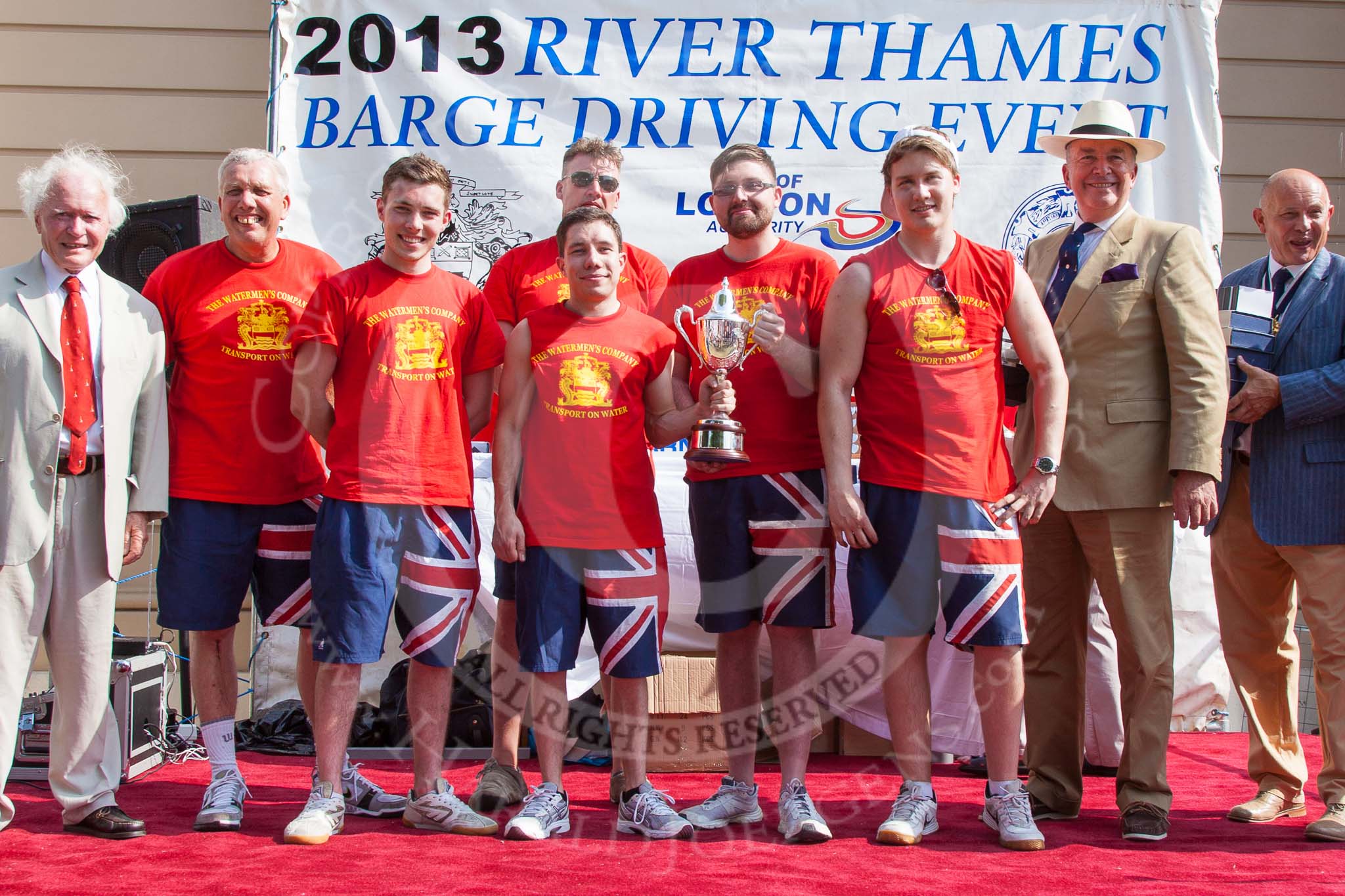 TOW River Thames Barge Driving Race 2013: The "Bill Lindley Trophy", for the second rank winner, goes to the crew of barge "Diana", by Trinity Buoy Wharf..
River Thames between Greenwich and Westminster,
London,

United Kingdom,
on 13 July 2013 at 16:25, image #577