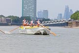 Photo 1307131241075D23776HaraldJoergens TOW River Thames Barge Driving Race 2013: Barge "Hoppy", by GPS Fabrication, approaching Masthouse Terrace Pier. On the left, only an oar can be seen of barge "Spirit of Mountabatten", by Mechanical Movements and Enabling Services Ltd. In the background the skyscrapers of the City of London..
River Thames between Greenwich and Westminster,
London,
United Kingdom,
on 13 July 2013 at 12:41, image #166