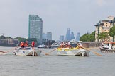 Photo 1307131241135D23781HaraldJoergens TOW River Thames Barge Driving Race 2013: Barge "Hoppy", by GPS Fabrication, approaching Masthouse Terrace Pier. On the left barge "Spirit of Mountabatten", by Mechanical Movements and Enabling Services Ltd. In the background the skyscrapers of the City of London. On the very left an oar of barge "Darren Lacey"..
River Thames between Greenwich and Westminster,
London,
United Kingdom,
on 13 July 2013 at 12:41, image #168