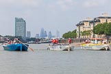 Photo 1307131241265D23804HaraldJoergens TOW River Thames Barge Driving Race 2013: Three barges abreast - from left "Darren Lacey", by Princess Pocahontas, "Spirit of Mountabatten", by Mechanical Movements and Enabling Services Ltd, and "Hoppy", by GPS Fabrication, approaching Masthouse Terrace Pier. In the background the skyscrapers in the City of London..
River Thames between Greenwich and Westminster,
London,
United Kingdom,
on 13 July 2013 at 12:41, image #173