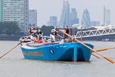 Photo 1307131241375D23811HaraldJoergens TOW River Thames Barge Driving Race 2013: Rear view of barge "Darren Lacey", by Princess Pocahontas, during the race, approaching Masthouse Terrace Pier. In the background the skyscrapers of the City of London, including the "Gherkin"..
River Thames between Greenwich and Westminster,
London,
United Kingdom,
on 13 July 2013 at 12:41, image #174