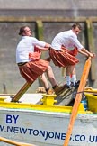 TOW River Thames Barge Driving Race 2013: Rowers wearing skirts on the deck of of barge "Hoppy" by GPS Fabrication..
River Thames between Greenwich and Westminster,
London,

United Kingdom,
on 13 July 2013 at 12:44, image #191