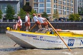 TOW River Thames Barge Driving Race 2013: Rowers in skirts on board of barge "Hoppy", by GPS Fabrication..
River Thames between Greenwich and Westminster,
London,

United Kingdom,
on 13 July 2013 at 13:15, image #301