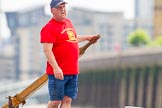 TOW River Thames Barge Driving Race 2013: The steerer on board of barge "Benjamin", by London Party Boats..
River Thames between Greenwich and Westminster,
London,

United Kingdom,
on 13 July 2013 at 13:18, image #310