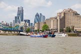 TOW River Thames Barge Driving Race 2013: Barge "Steve Faldo" by Capital Pleasure Boats, and barge "Diana", by Trinity Buoy Wharf, behind, approaching Tower Bridge, with the "Gherkin" building on the right..
River Thames between Greenwich and Westminster,
London,

United Kingdom,
on 13 July 2013 at 13:40, image #376