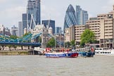 TOW River Thames Barge Driving Race 2013: Barge "Steve Faldo" by Capital Pleasure Boats, and barge "Diana", by Trinity Buoy Wharf, behind, approaching Tower Bridge, with the "Gherkin" building on the right..
River Thames between Greenwich and Westminster,
London,

United Kingdom,
on 13 July 2013 at 13:40, image #377