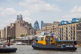 TOW River Thames Barge Driving Race 2013: The S. Walsh tug "SWS Breda"passing the Royal Navy "HMS President" andd the "Gherkin" building..
River Thames between Greenwich and Westminster,
London,

United Kingdom,
on 13 July 2013 at 13:43, image #381