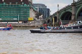 TOW River Thames Barge Driving Race 2013: Barge "Diana", by Trinity Buoy Wharf, crossing the finish of the race at Westminster Bridge, followed by barge "Steve Faldo" by Capital Pleasure Boats..
River Thames between Greenwich and Westminster,
London,

United Kingdom,
on 13 July 2013 at 14:18, image #428