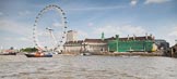 TOW River Thames Barge Driving Race 2013: Barge "Spirit of Mountabatten", by Mechanical Movements and Enabling Services Ltd, and barge "Hoppy", by GPS Fabrication, in a wide angle view including the London Eye and the London Aquarium, close to the finish of the race at Westminster Bridge, on the very right..
River Thames between Greenwich and Westminster,
London,

United Kingdom,
on 13 July 2013 at 14:26, image #461