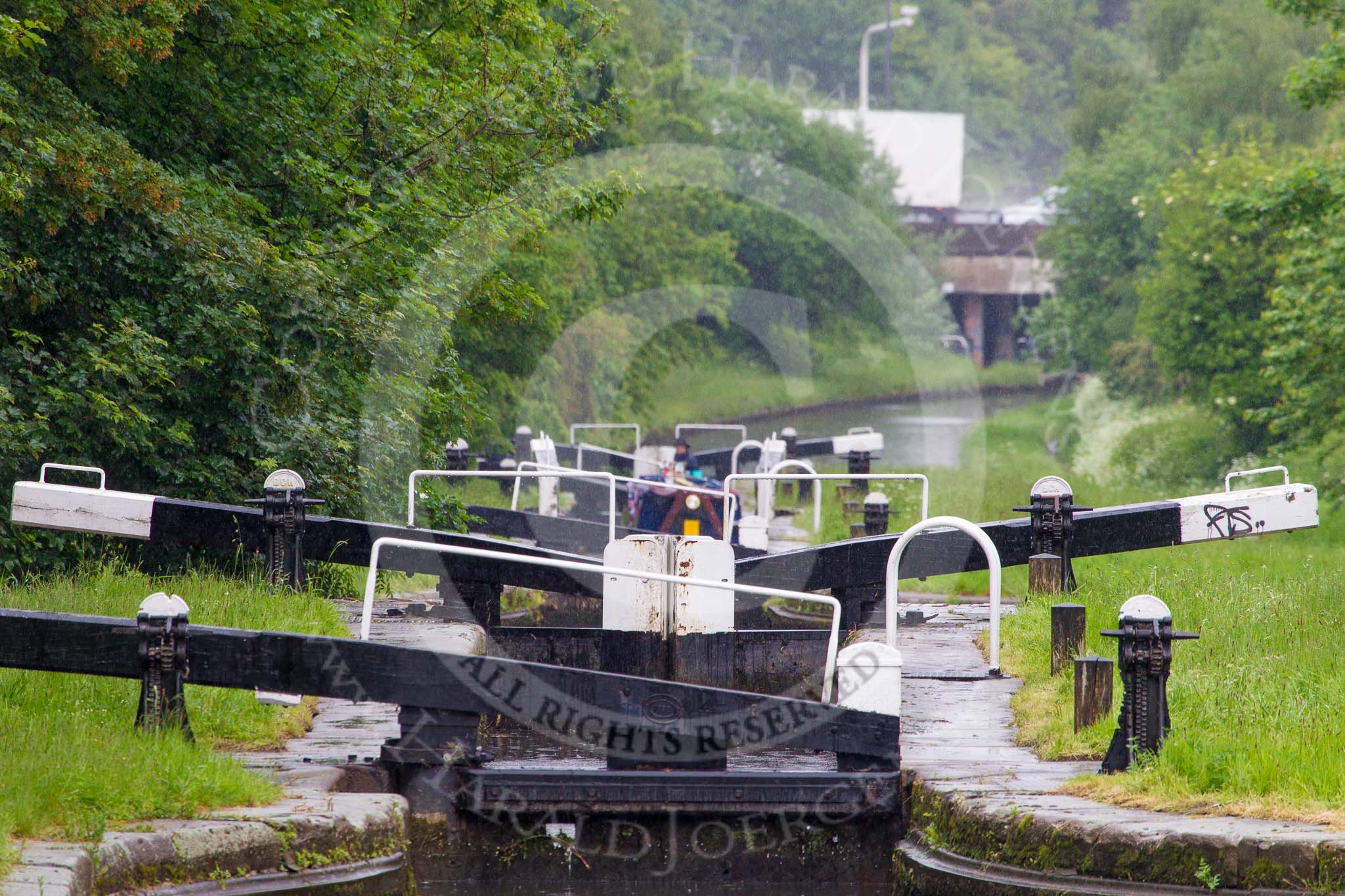 BCN Marathon Challenge 2014: Looking down the Perry Bar Locks on the Tame Valley Canal from the pond between locks 6 and 7, with the M6 motorway in the background.
Birmingham Canal Navigation,


United Kingdom,
on 24 May 2014 at 13:57, image #120
