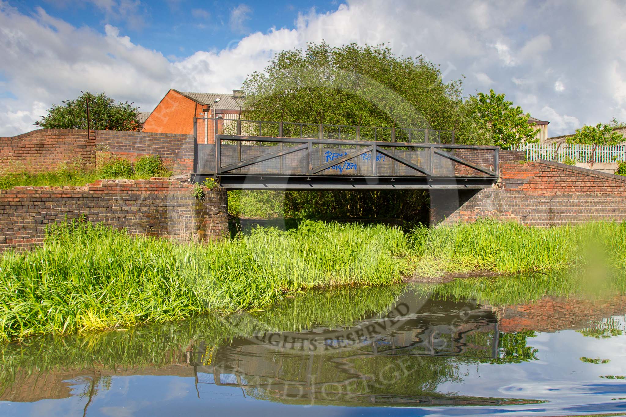 BCN Marathon Challenge 2014: Old factory bridge on the New Main Line close to Pudding Green Junction, the arm could have served Ireland Green Colliery.
Birmingham Canal Navigation,


United Kingdom,
on 24 May 2014 at 17:31, image #168