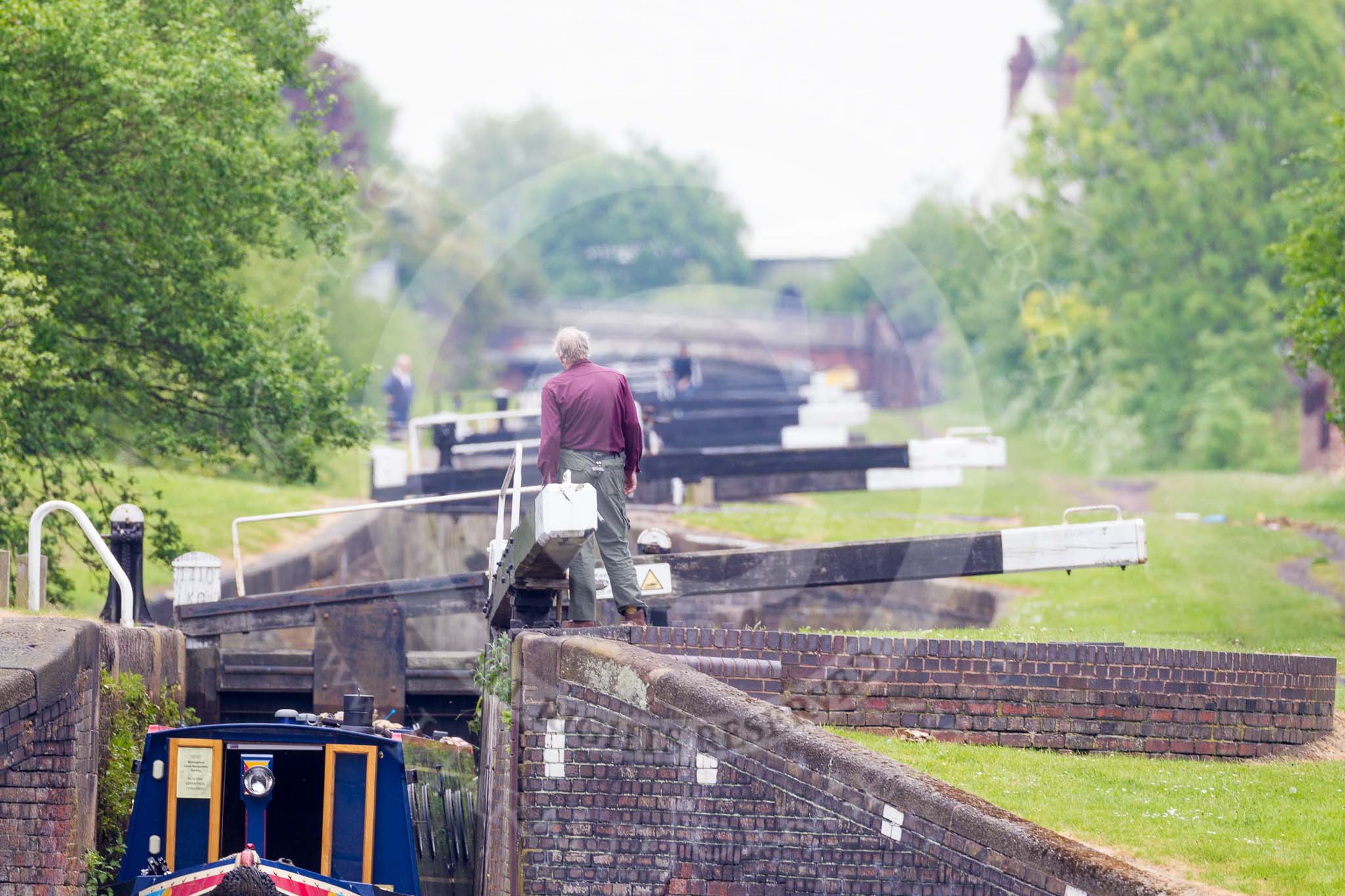 BCN 24h Marathon Challenge 2015: Ryders Green Locks on the Walsall Canal, the distances appear compressed because of the long lens used.
Birmingham Canal Navigations,



on 23 May 2015 at 14:23, image #117