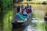 : Historic narrowboat is poled towards Marple bottom lock. Without an engine it's either the momentum or manual work that moves the boat into a lock, once the tow line has been released..




on 03 July 2015 at 15:19, image #29