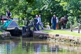 Photo 1507031532501D44763HaraldJoergens : Narrowboat Maria is ready to leave Marple bottom lock, boat horse Bilbo is on the way to pick up the tow line.
on 03 July 2015 at 15:32, image #34