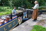 Photo 1507031542195D22974HaraldJoergens : CRT's Richard Parry and Horseboat Association's Sue Day at lock 2 of the Marple flight. To get butty Maria into a lock, the big rudder has to be pulled to the side, and the tiller has to be removed..
on 03 July 2015 at 15:42, image #44