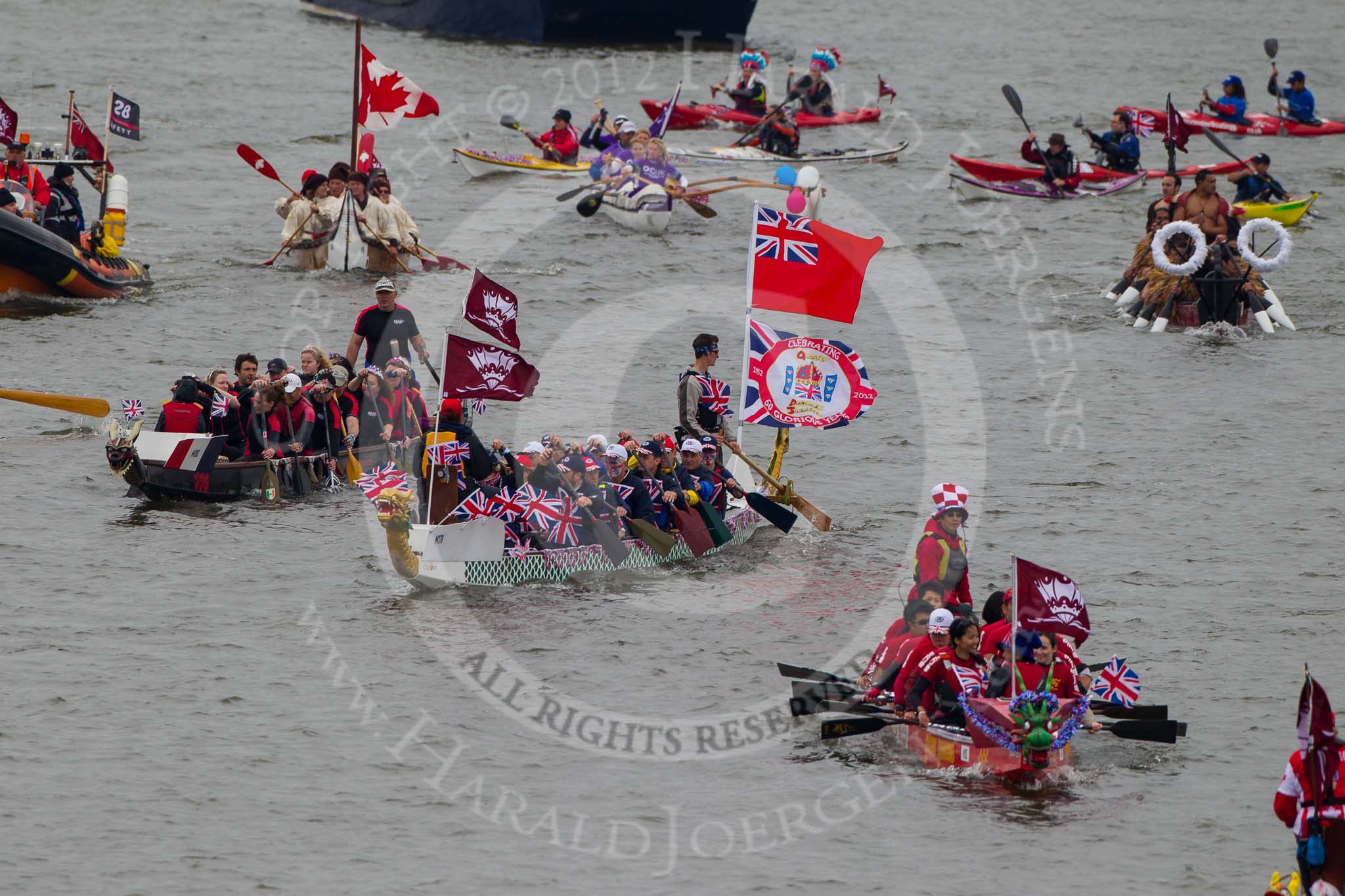 Thames Diamond Jubilee Pageant: DRAGON BOATS-Racing Dragons/Red Lotus (M183), Wraysbury Dragons ( M178),Thames Dragons (M180)..
River Thames seen from Battersea Bridge,
London,

United Kingdom,
on 03 June 2012 at 14:48, image #127