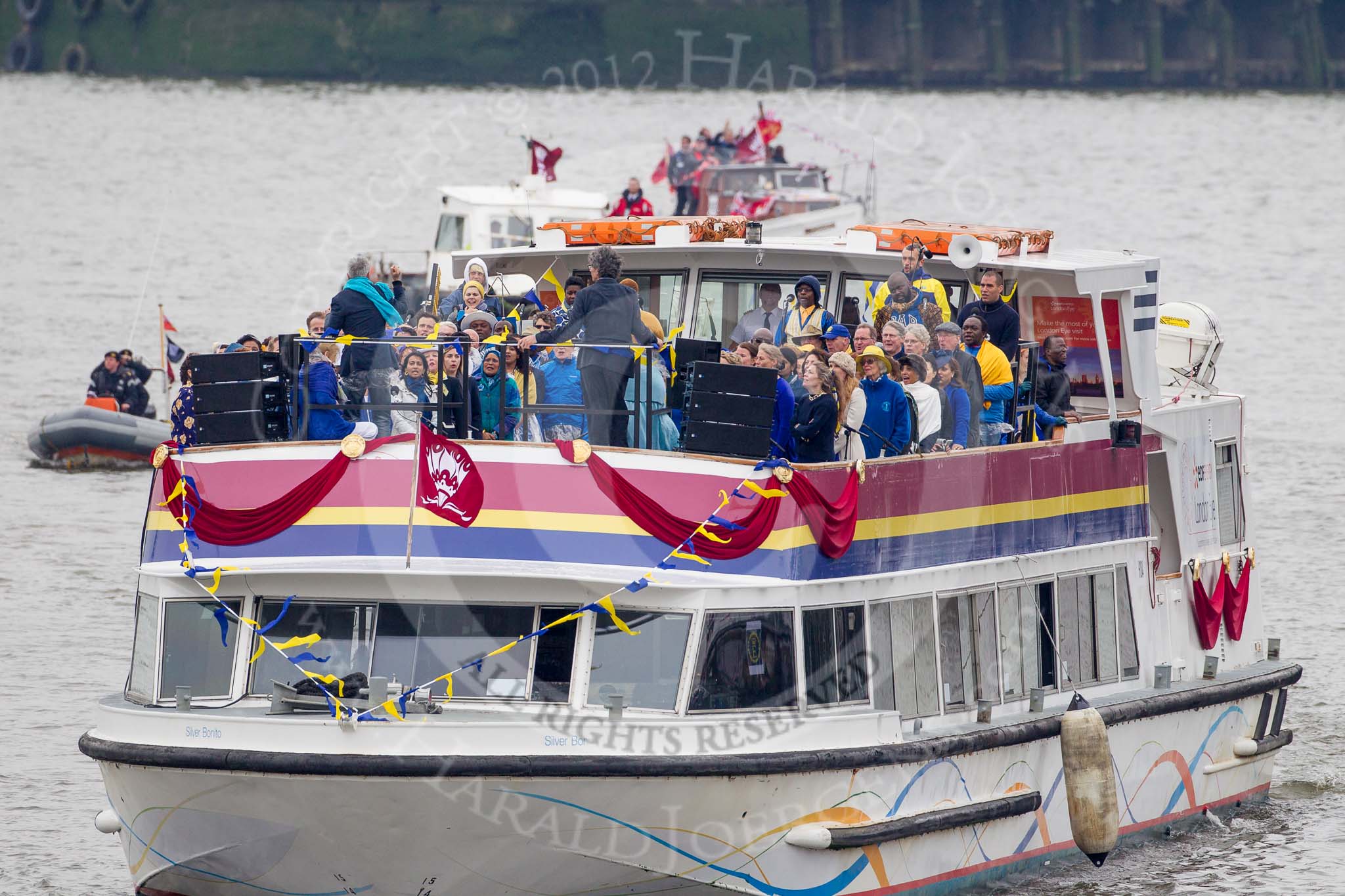 Thames Diamond Jubilee Pageant: JUBILANT COMMONWEALTH CHOIR- Silver Bonito (H104)..
River Thames seen from Battersea Bridge,
London,

United Kingdom,
on 03 June 2012 at 15:29, image #370