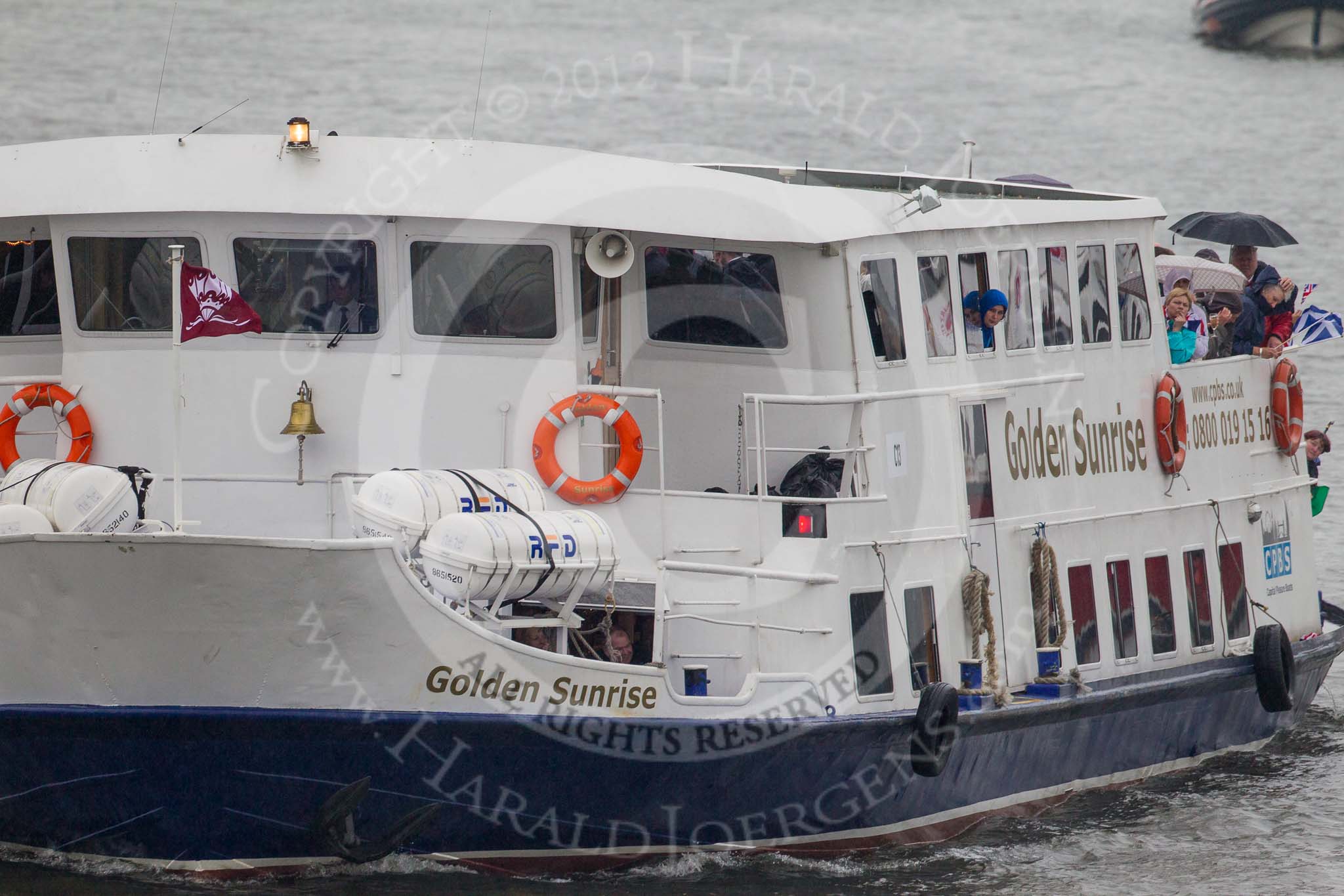 Thames Diamond Jubilee Pageant: PASSENGER BOATS- Golden Sunrise (C13)..
River Thames seen from Battersea Bridge,
London,

United Kingdom,
on 03 June 2012 at 16:11, image #546