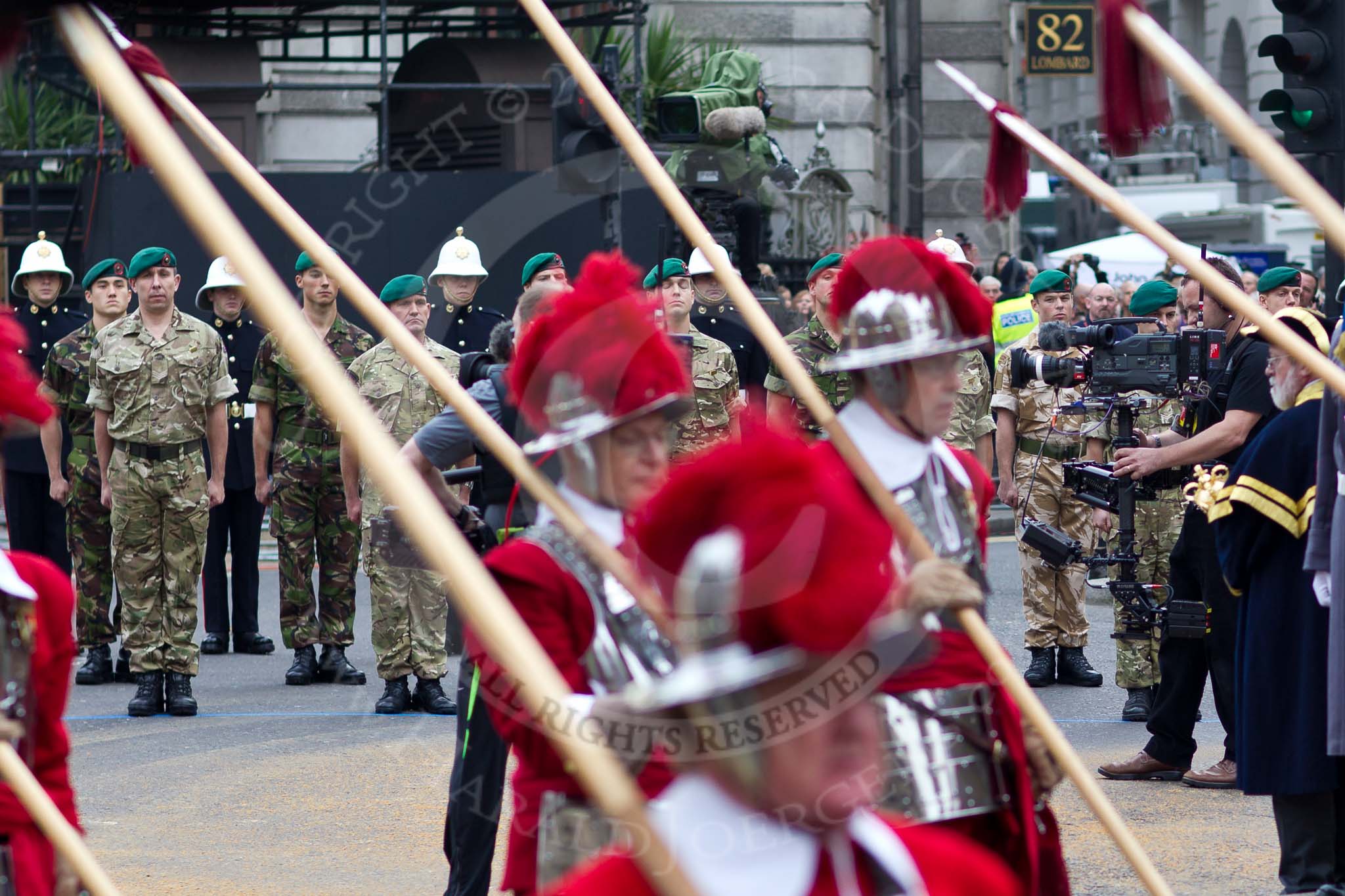 The Lord Mayor's Show 2011: The new Lord Mayor's Guard of Honour, Royal Marines Reserve, City of London, seen through the pikemen of the HAC..
Opposite Mansion House, City of London,
London,
-,
United Kingdom,
on 12 November 2011 at 10:53, image #51