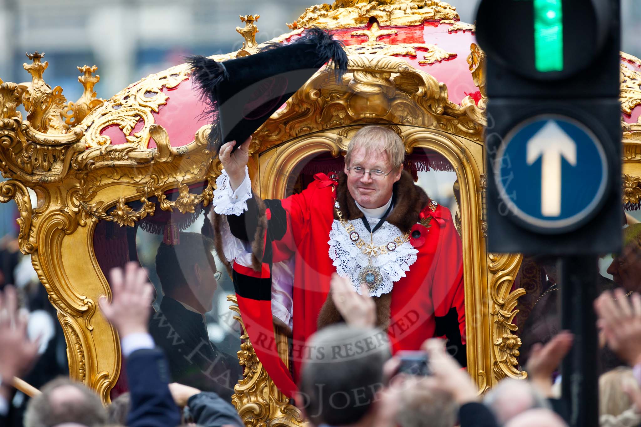 The Lord Mayor's Show 2011: The new Lord Mayor, David Wootton, waving from the golden state coach that is about to carry him to St Pauls Catherdral..
Opposite Mansion House, City of London,
London,
-,
United Kingdom,
on 12 November 2011 at 12:19, image #760