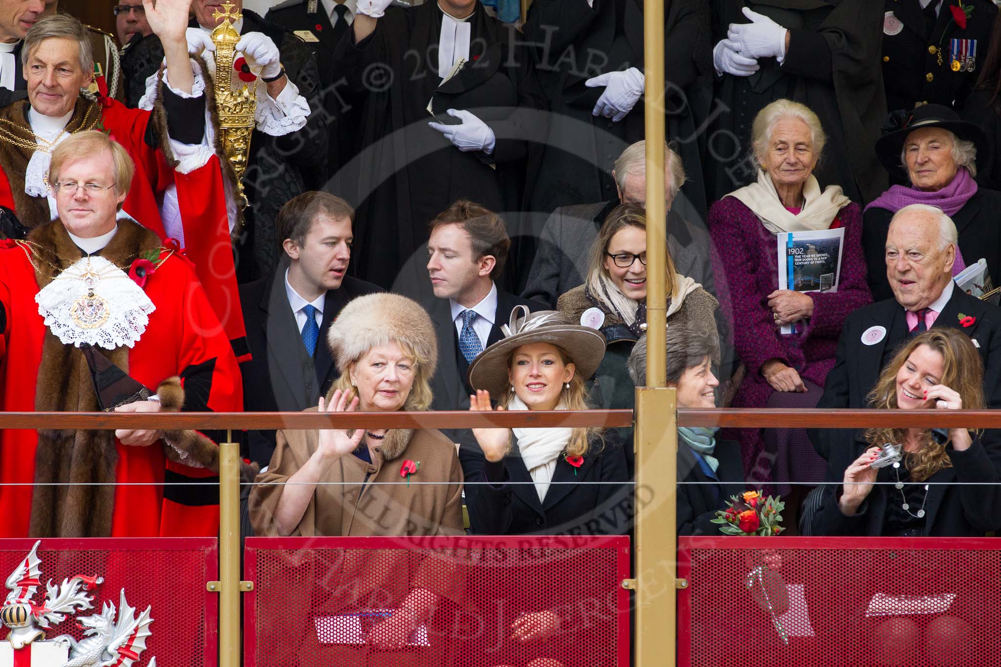 Lord Mayor's Show 2012: The outgoing Lord Mayor, David Wootton, the outgoing Lady Mayoress, Liz Wootton, Sophie Wootton, and James and Christopher Wootton behind..
Press stand opposite Mansion House, City of London,
London,
Greater London,
United Kingdom,
on 10 November 2012 at 11:06, image #295