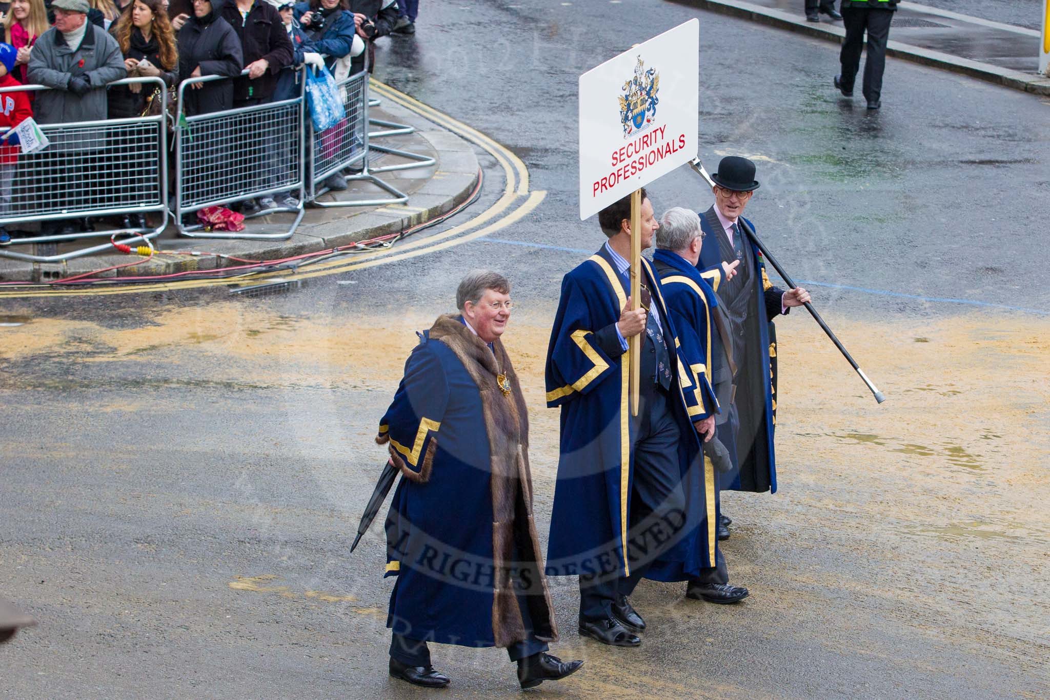 Lord Mayor's Show 2012: Entrry 104 - Modern Livery Companies, representing 26 Livery Companies..
Press stand opposite Mansion House, City of London,
London,
Greater London,
United Kingdom,
on 10 November 2012 at 11:51, image #1445