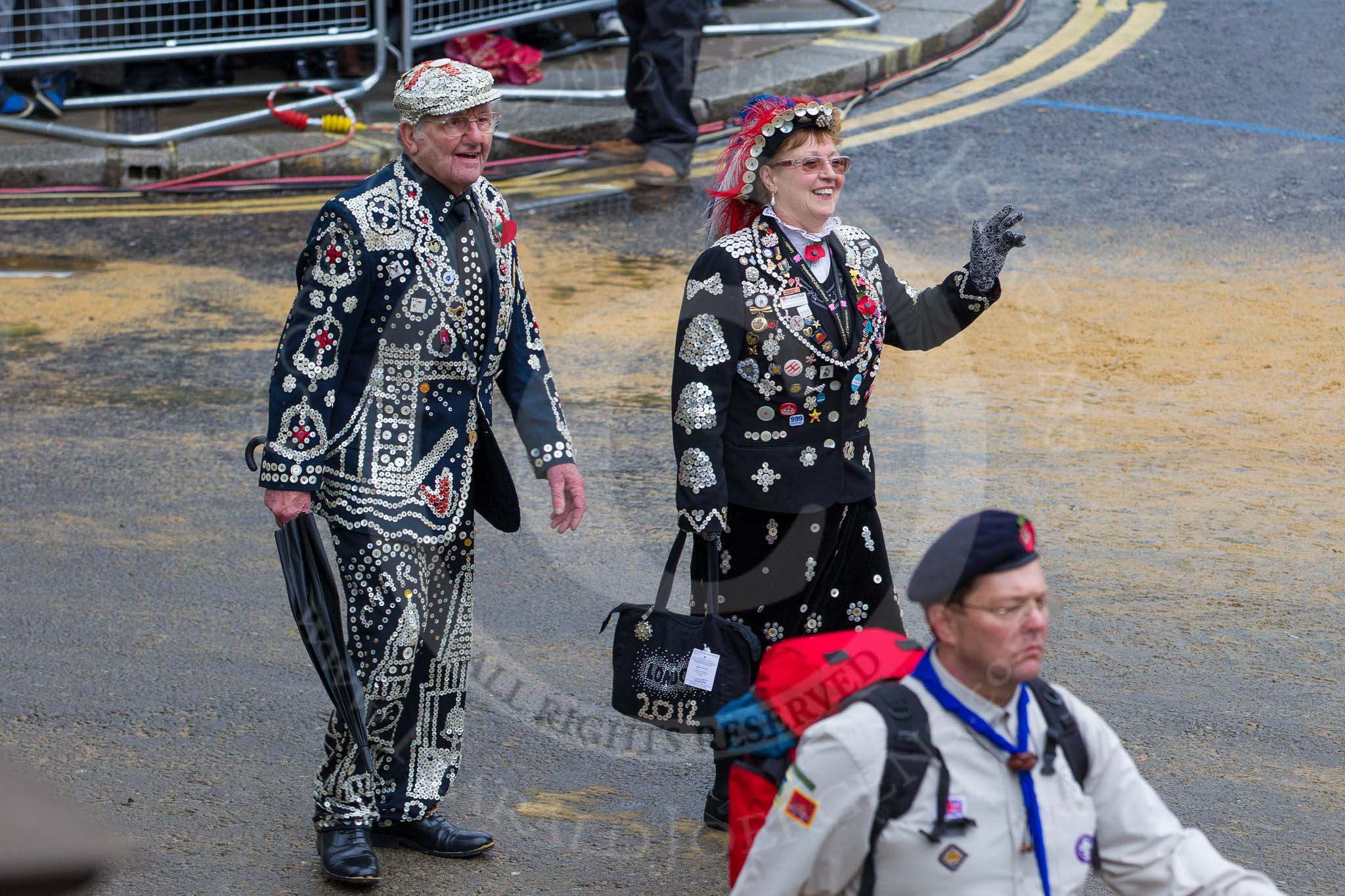 Lord Mayor's Show 2012: Entry 105 - Corps of Drums Society, here with a  London Pearly Queen and King..
Press stand opposite Mansion House, City of London,
London,
Greater London,
United Kingdom,
on 10 November 2012 at 11:53, image #1483