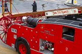 Lord Mayor's Show 2012: Entrry 104 - Modern Livery Companies, representing 26 Livery Companies, here with a historic Dennis fire engine..
Press stand opposite Mansion House, City of London,
London,
Greater London,
United Kingdom,
on 10 November 2012 at 11:52, image #1463